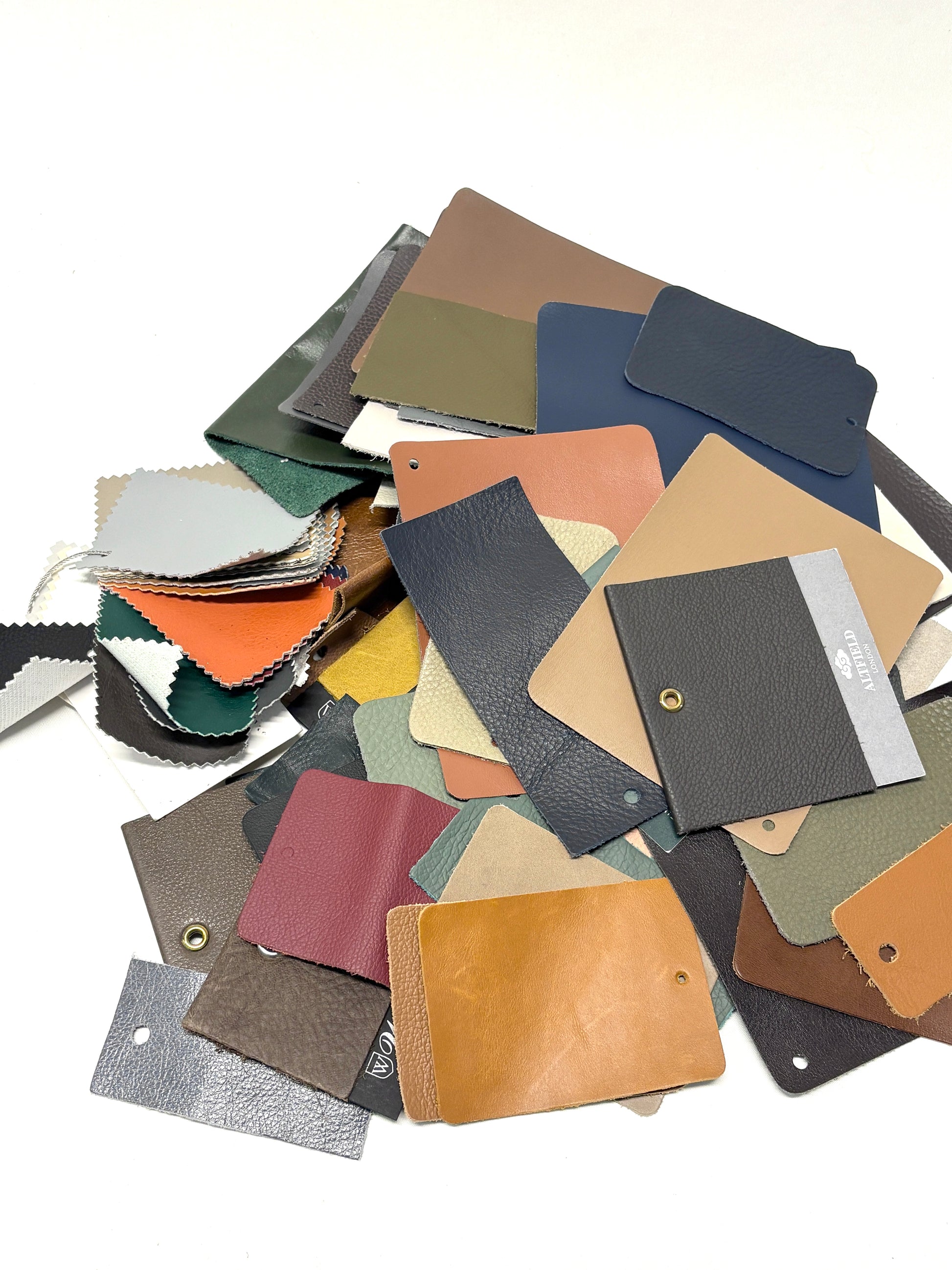 Collection of leather colour swatches with various sizes 