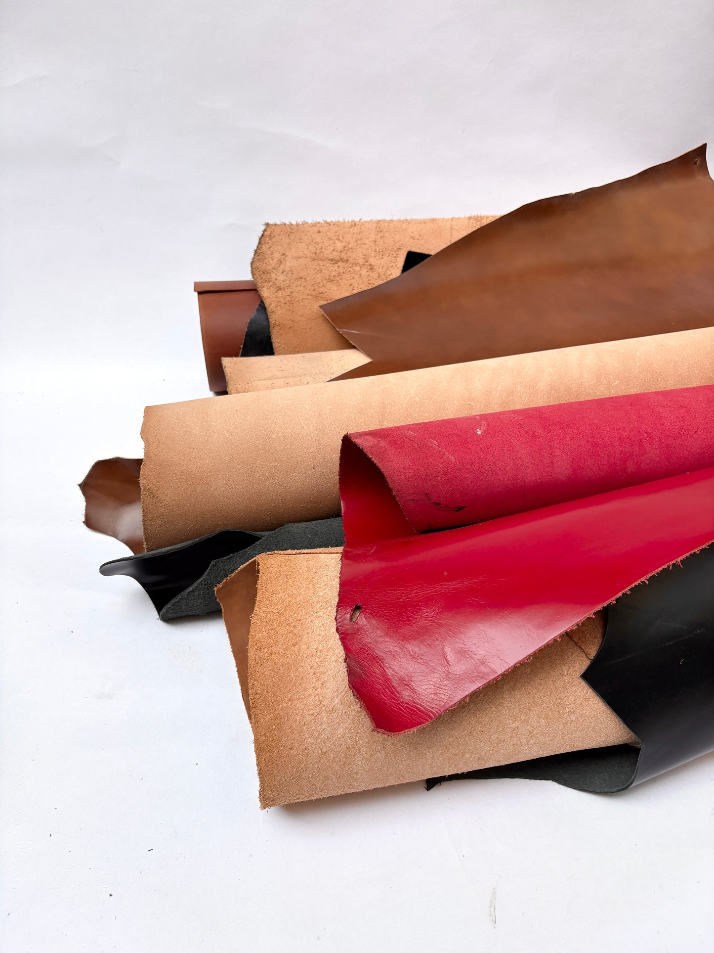 Collection of leather pieces in various colours 