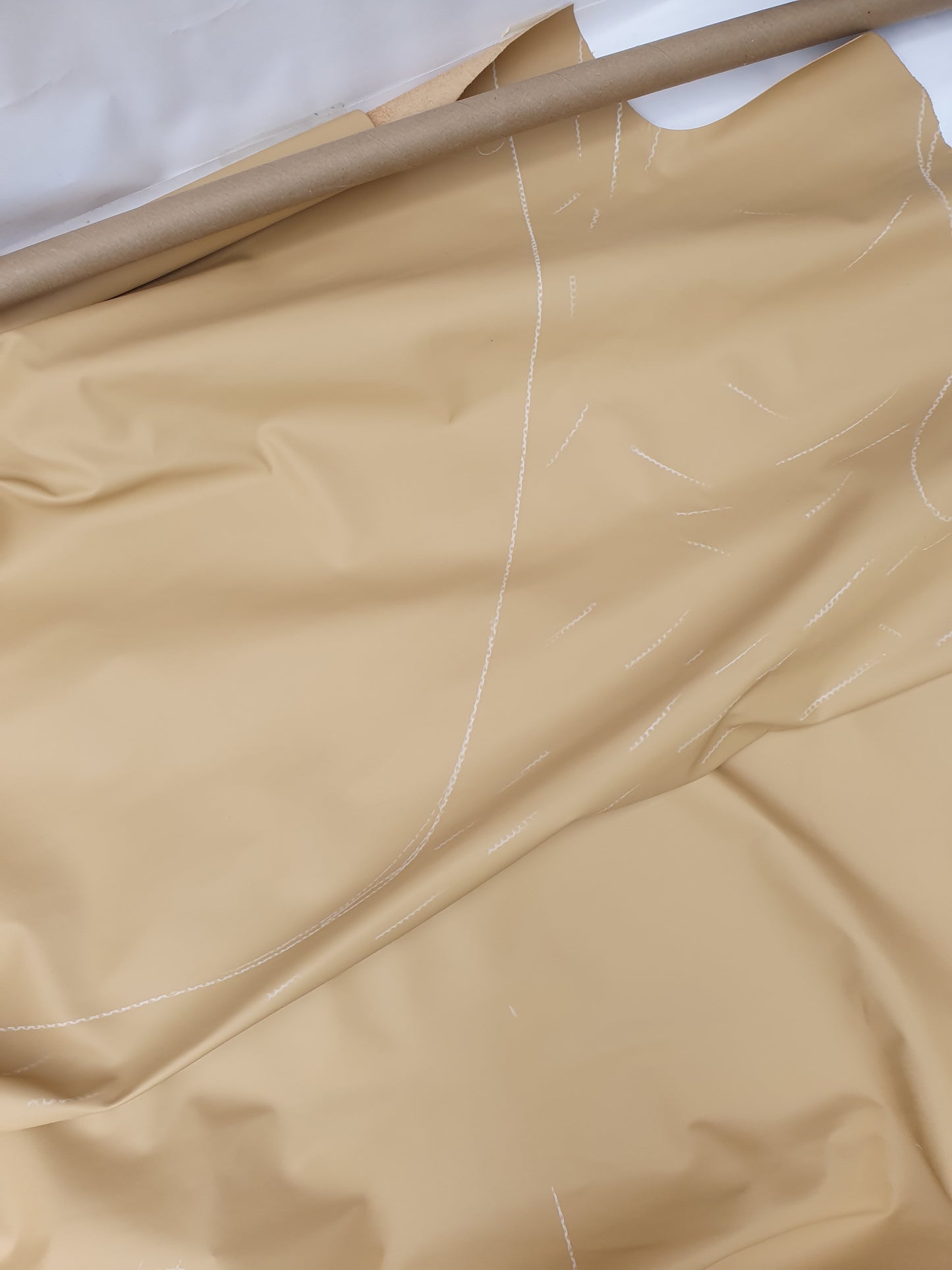 Cowhide camel rolled leather with visible marking lines 