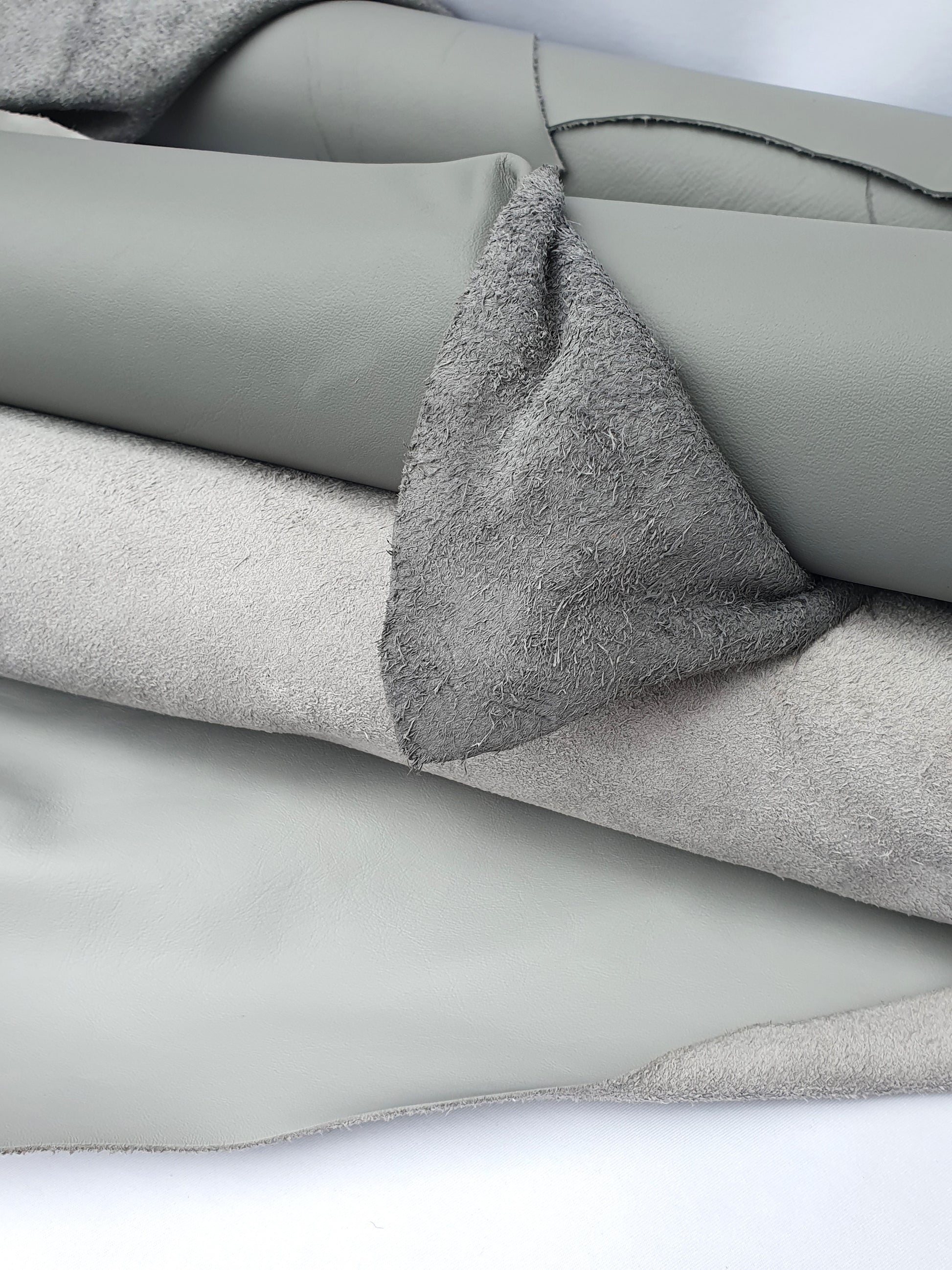 Rolled leather in grey and light grey 
