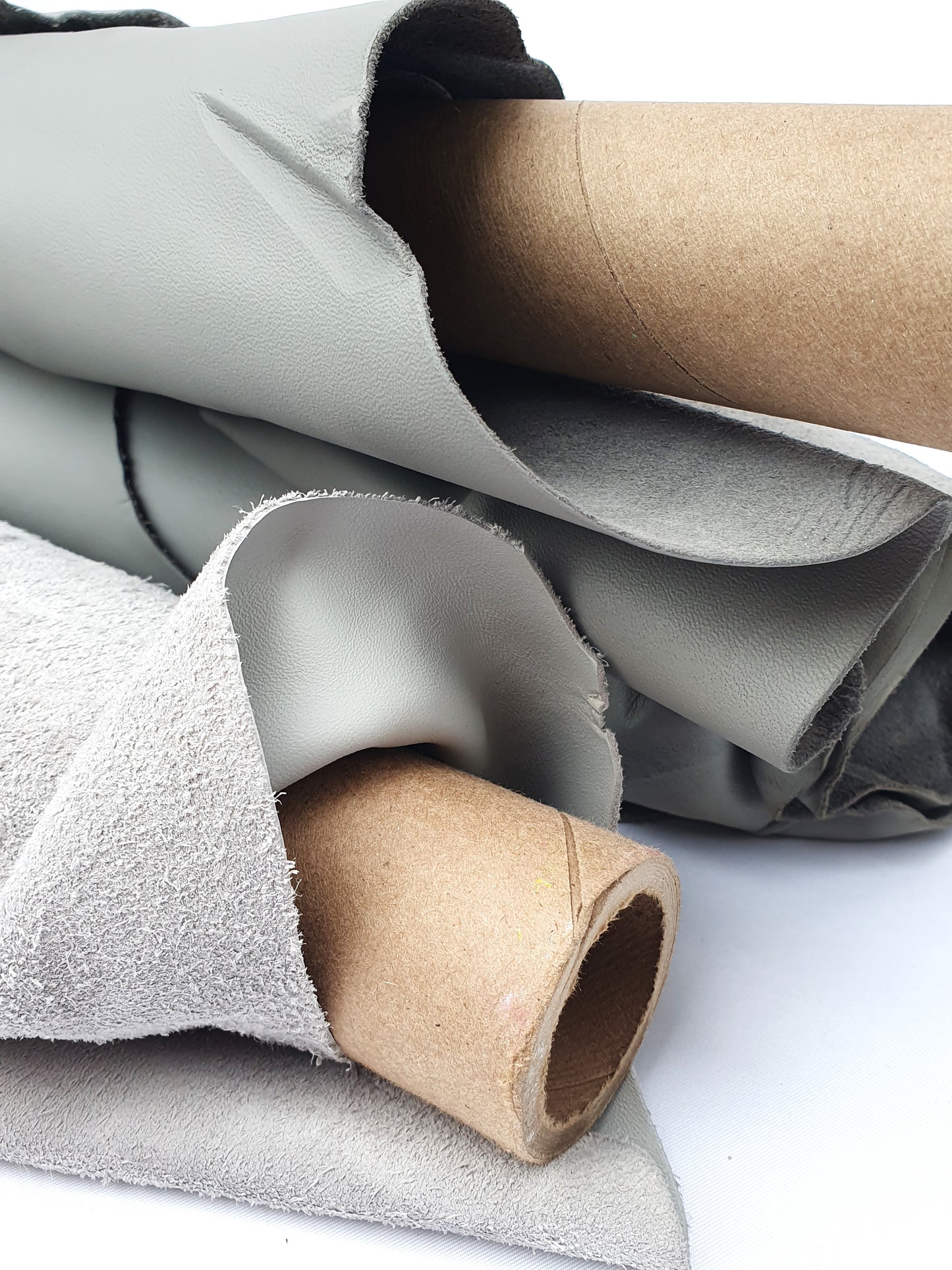 Two rolled leather in grey and light grey 
