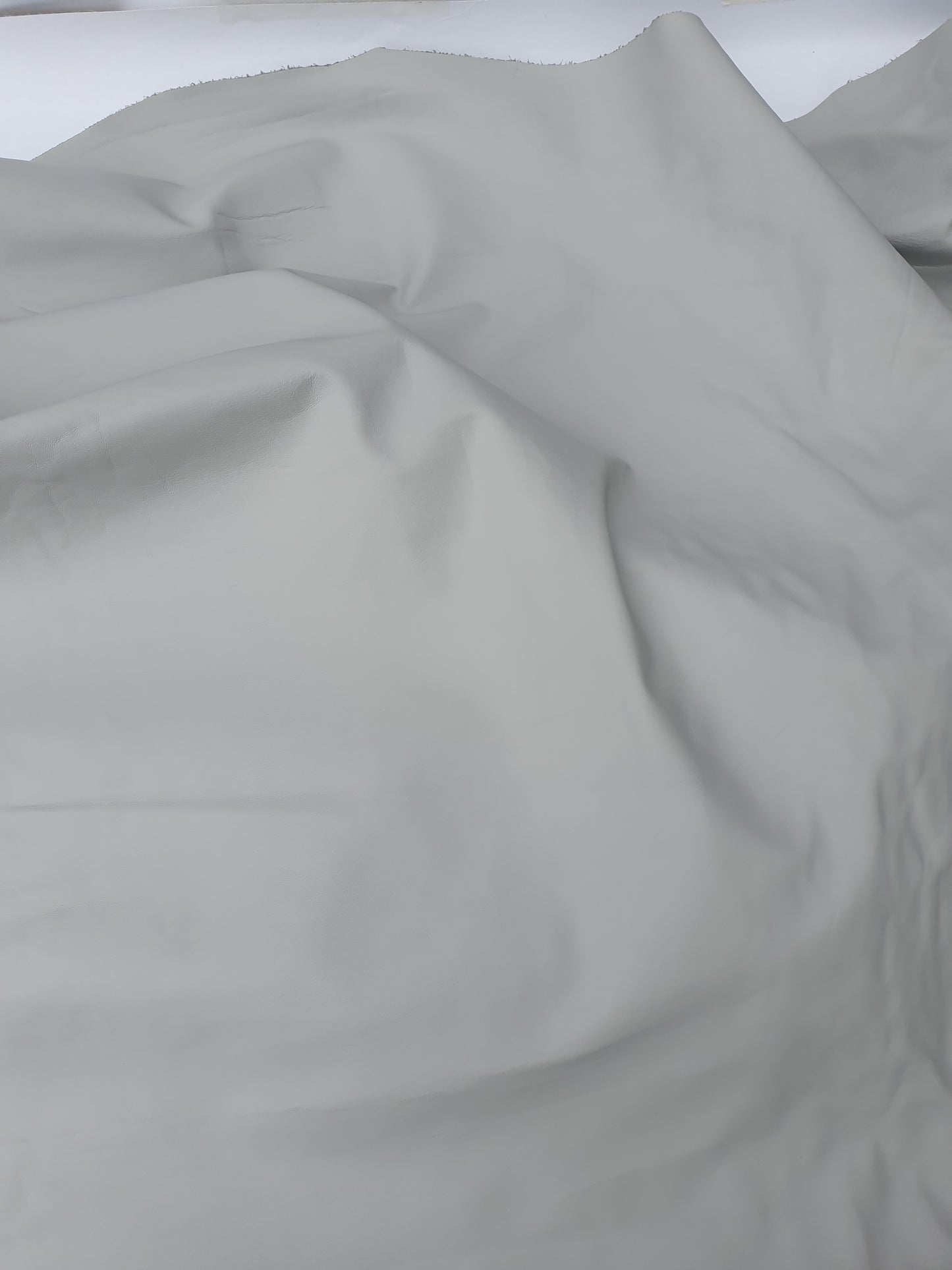 Two rolled leather in grey and light grey 