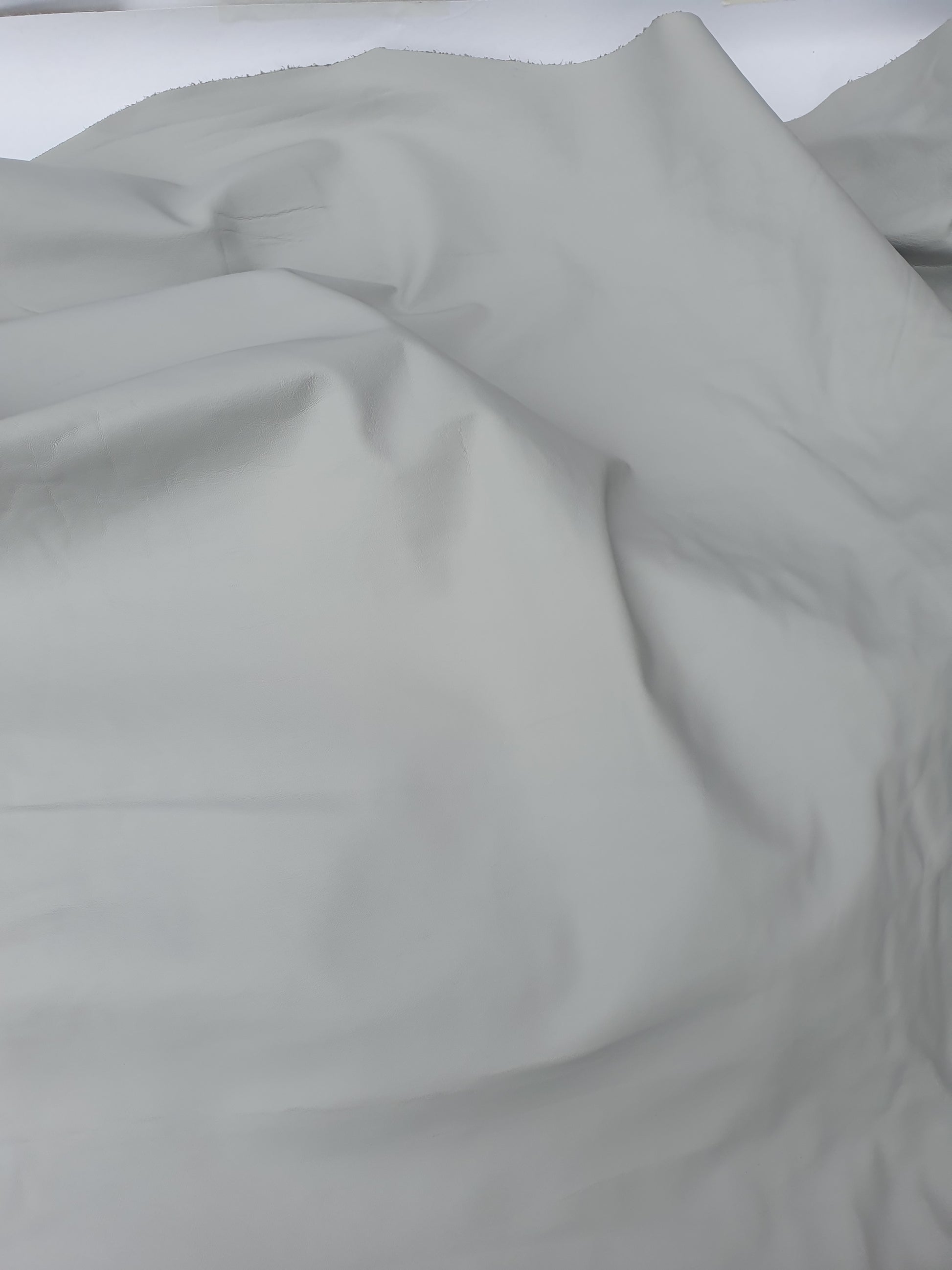 Two rolled leather in grey and light grey 