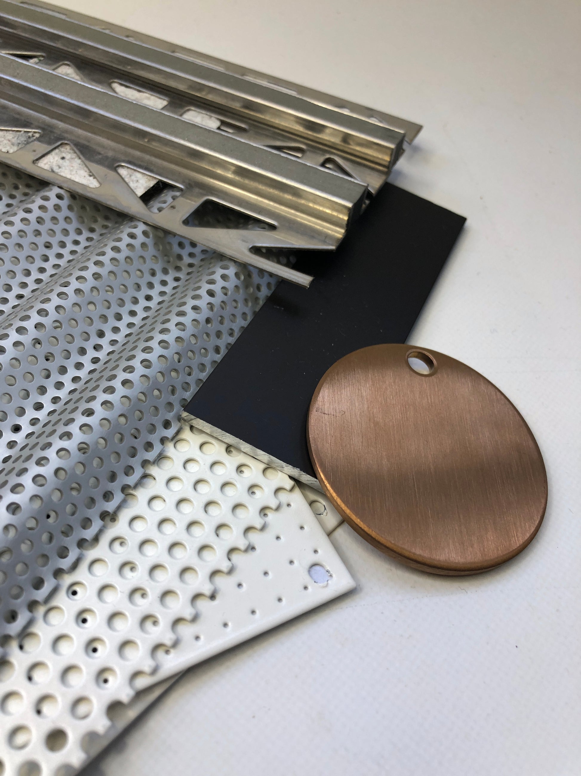 Close-up of collection of various types of metal samples with various colours