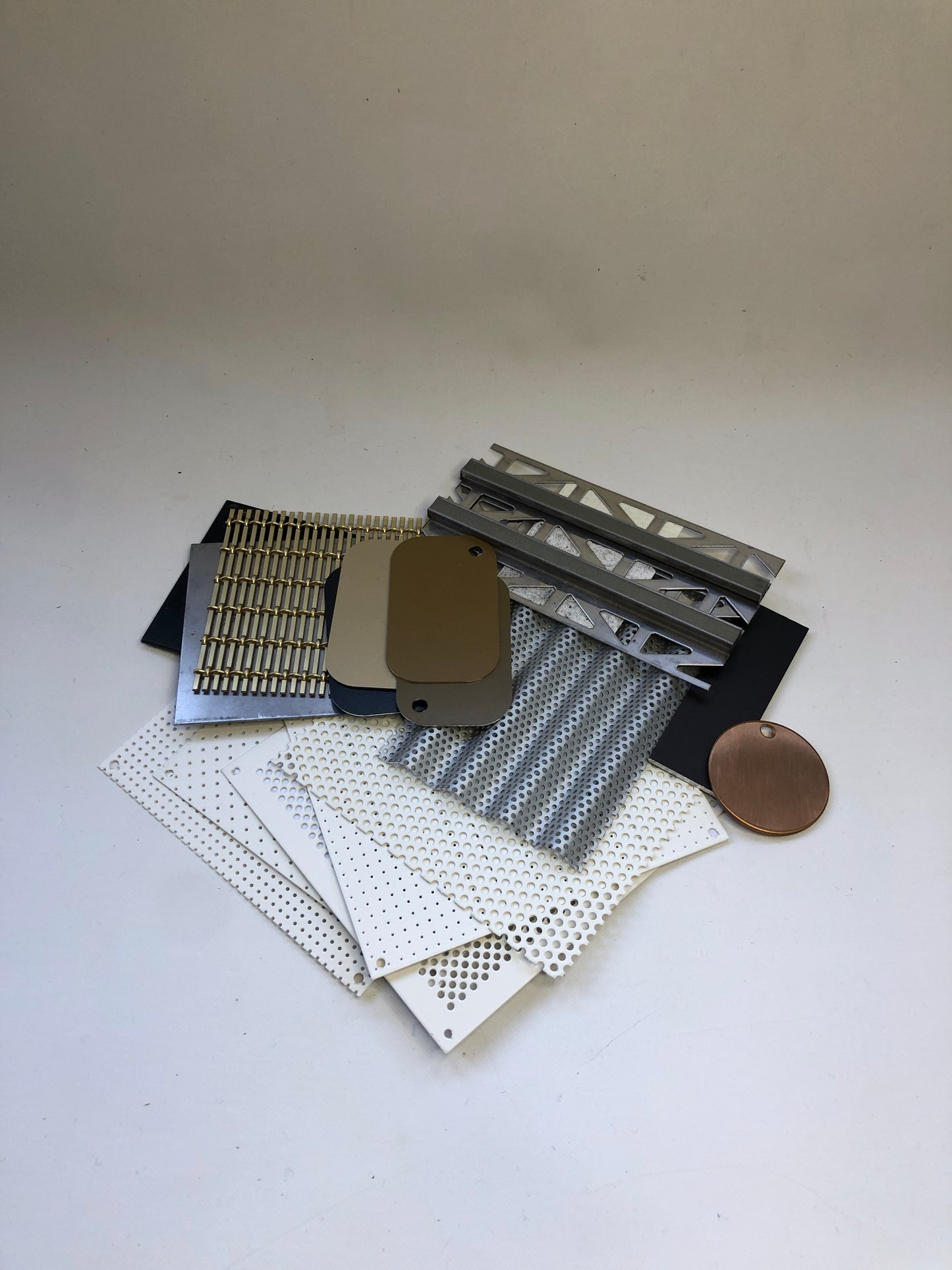 Collection of various types of metal samples with various colours 