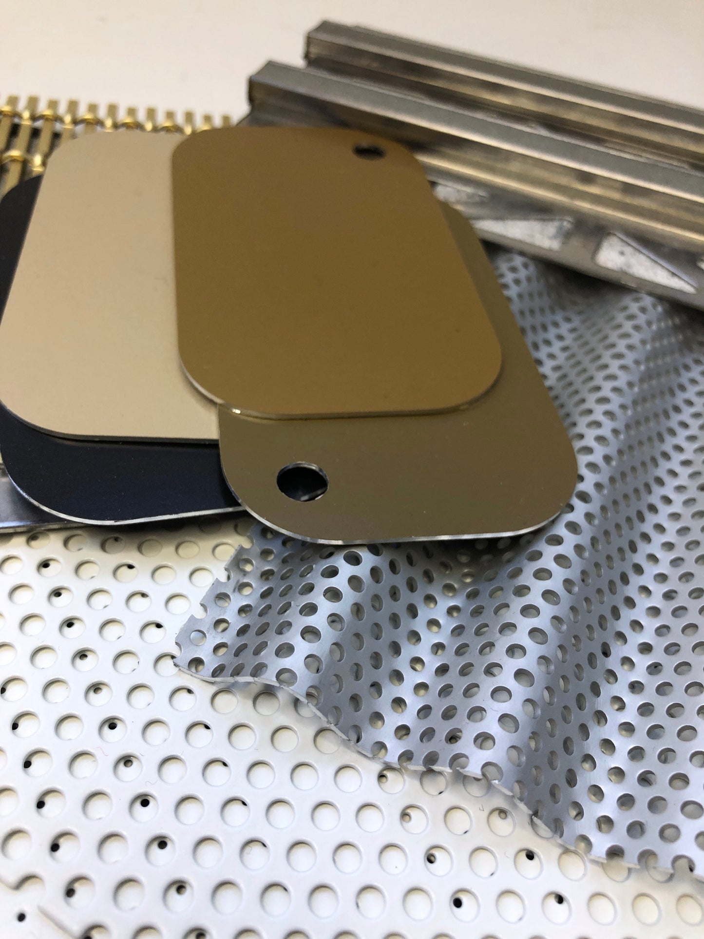 Close-up of collection of various types of metal samples with various colours