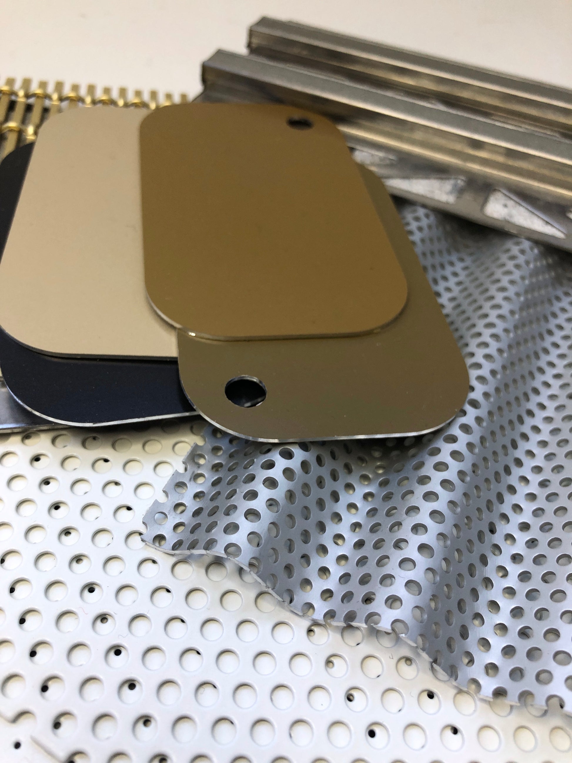 Close-up of collection of various types of metal samples with various colours