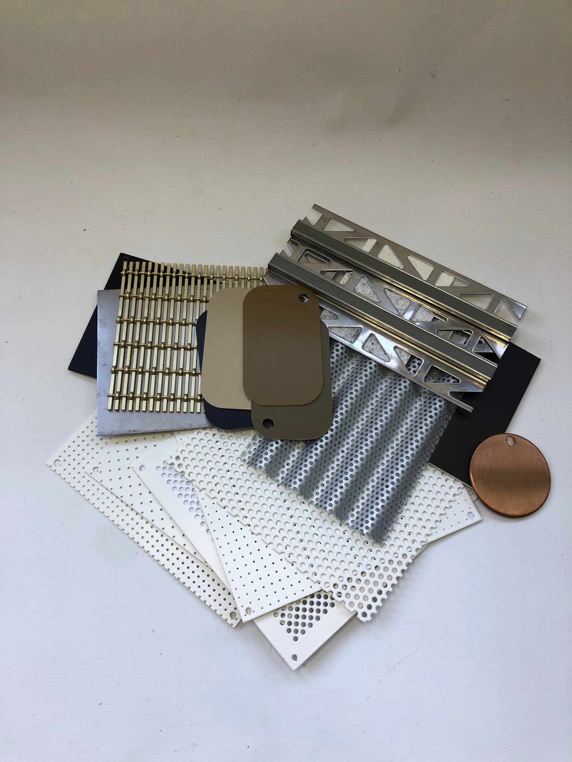 Collection of various types of metal samples with various colours 