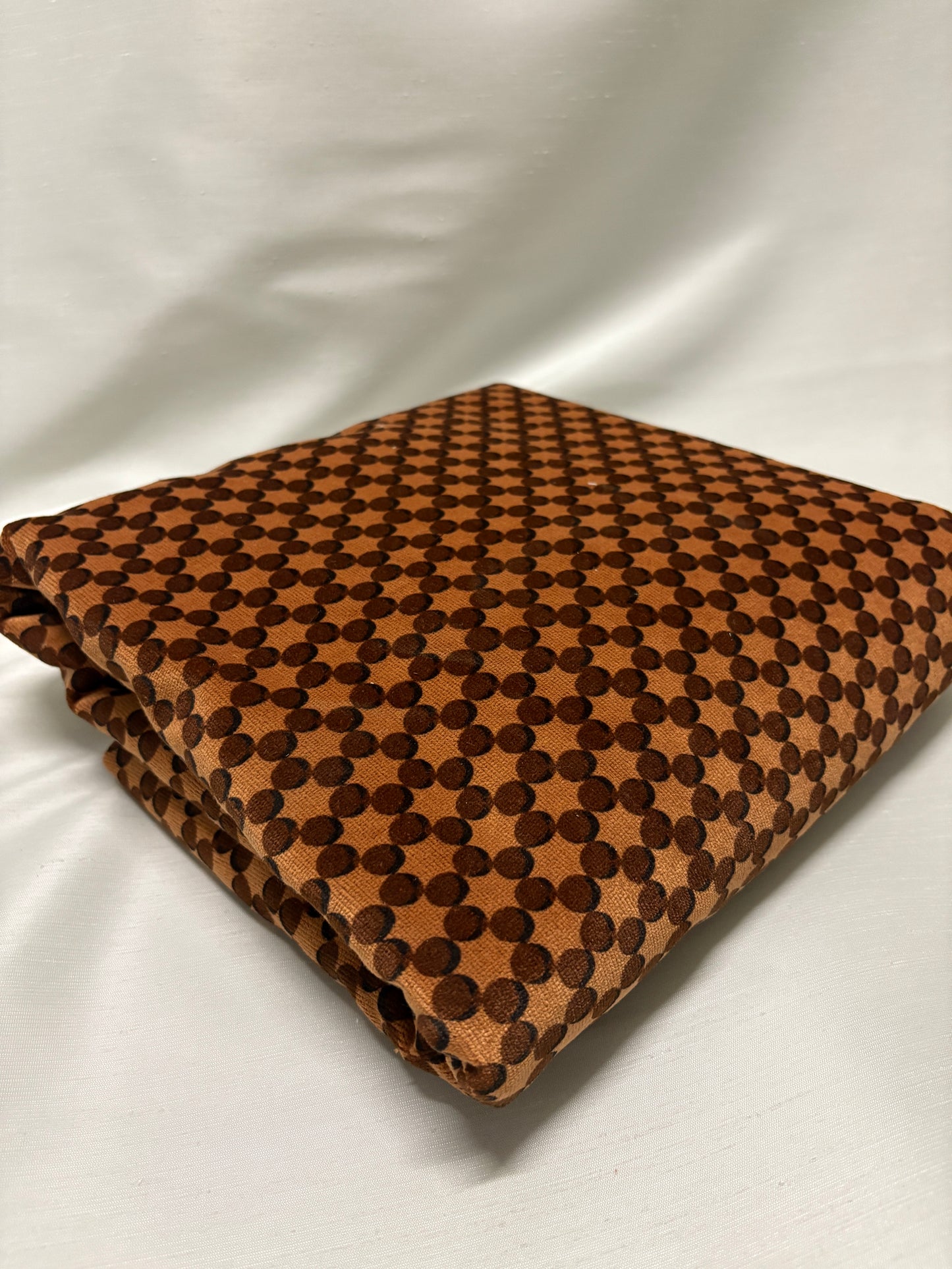 Orange dot patterned velvet fabric