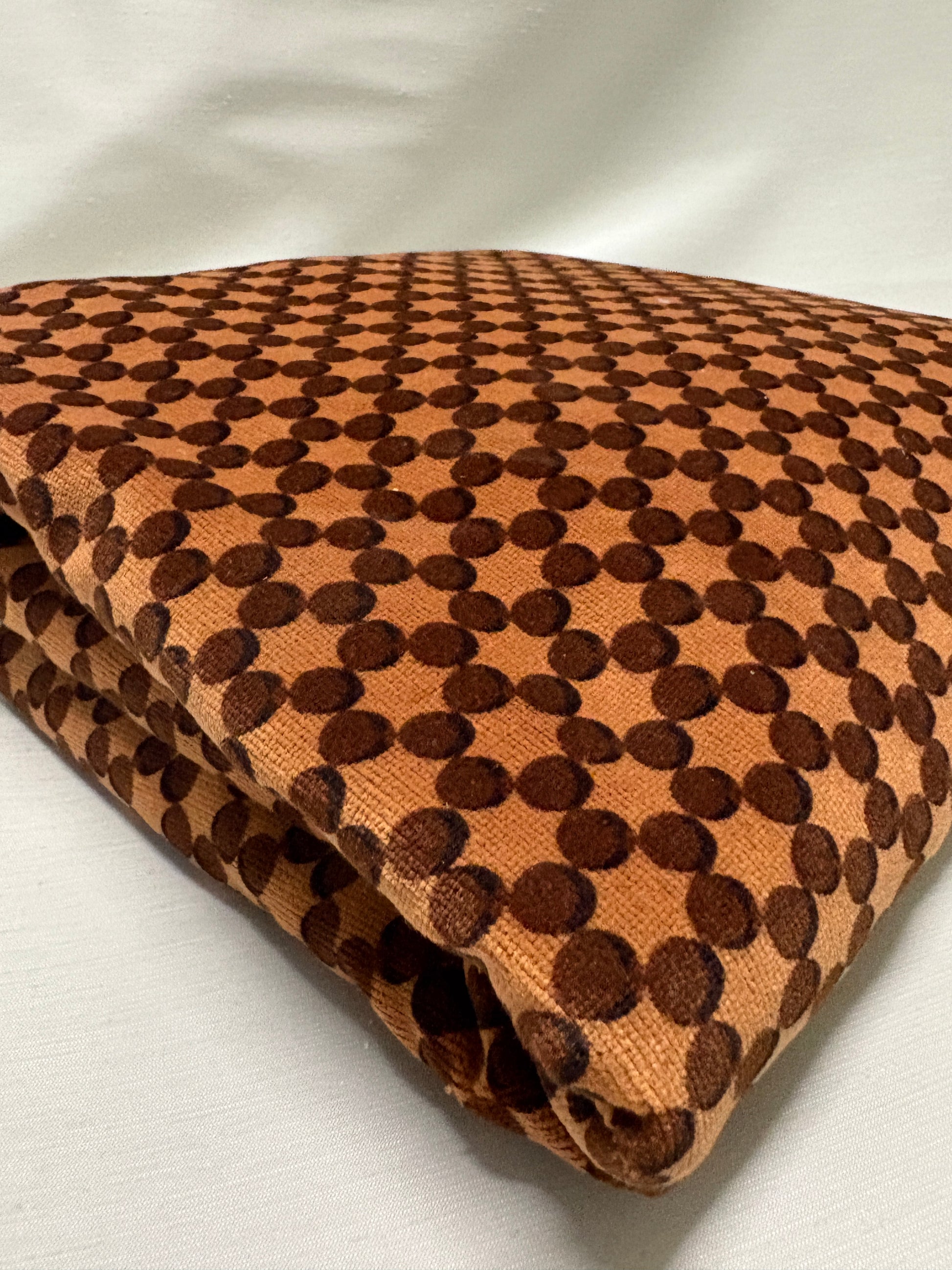 Orange dot patterned velvet fabric