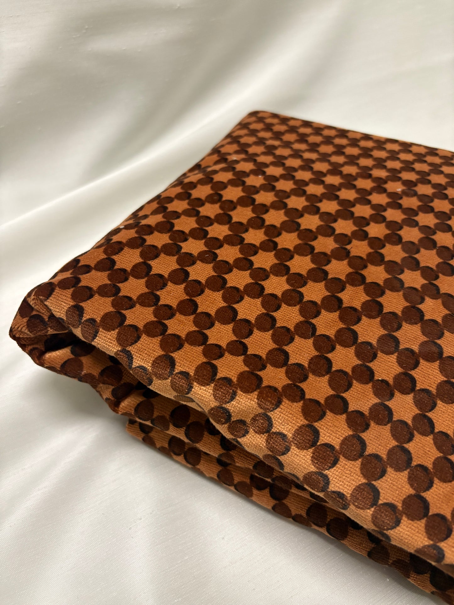 Orange dot patterned velvet fabric