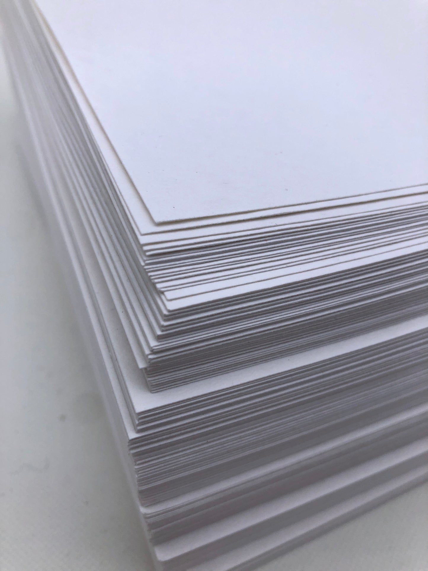 Close-up of a stack of white paper