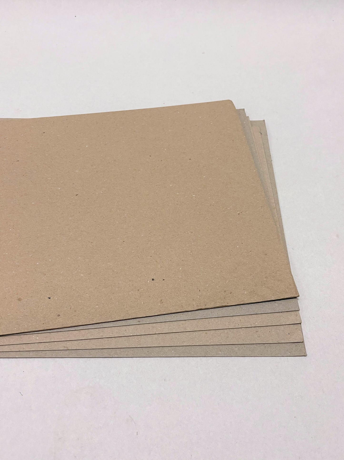 A stack of brown thick sheets 