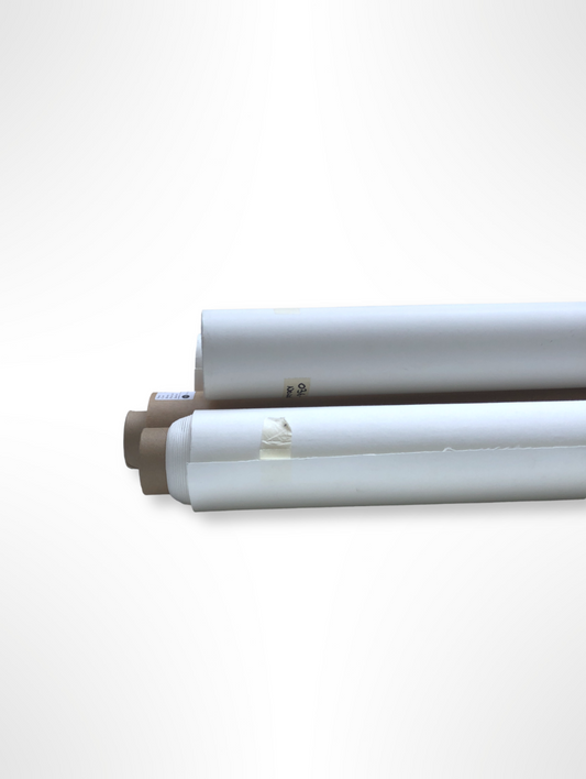 Collection of rolled white canvas papers