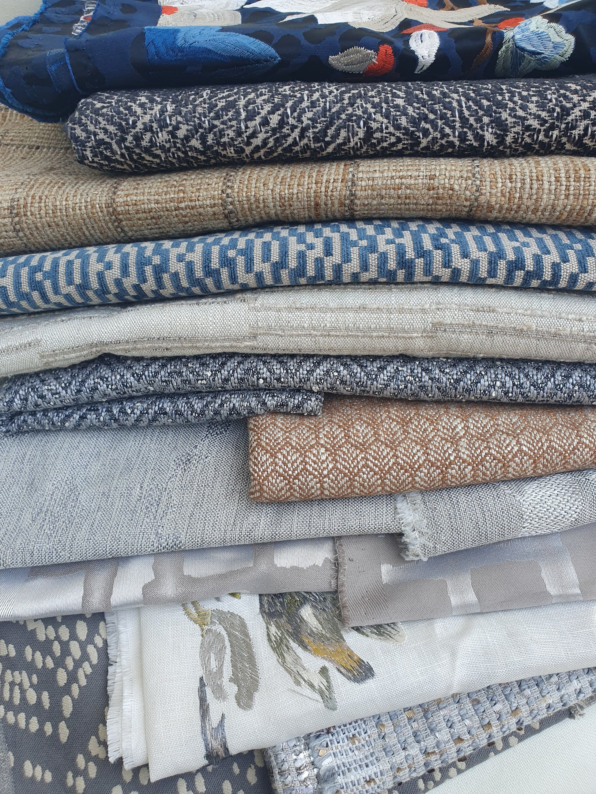 Close-up of a stack of various patterned fabric 