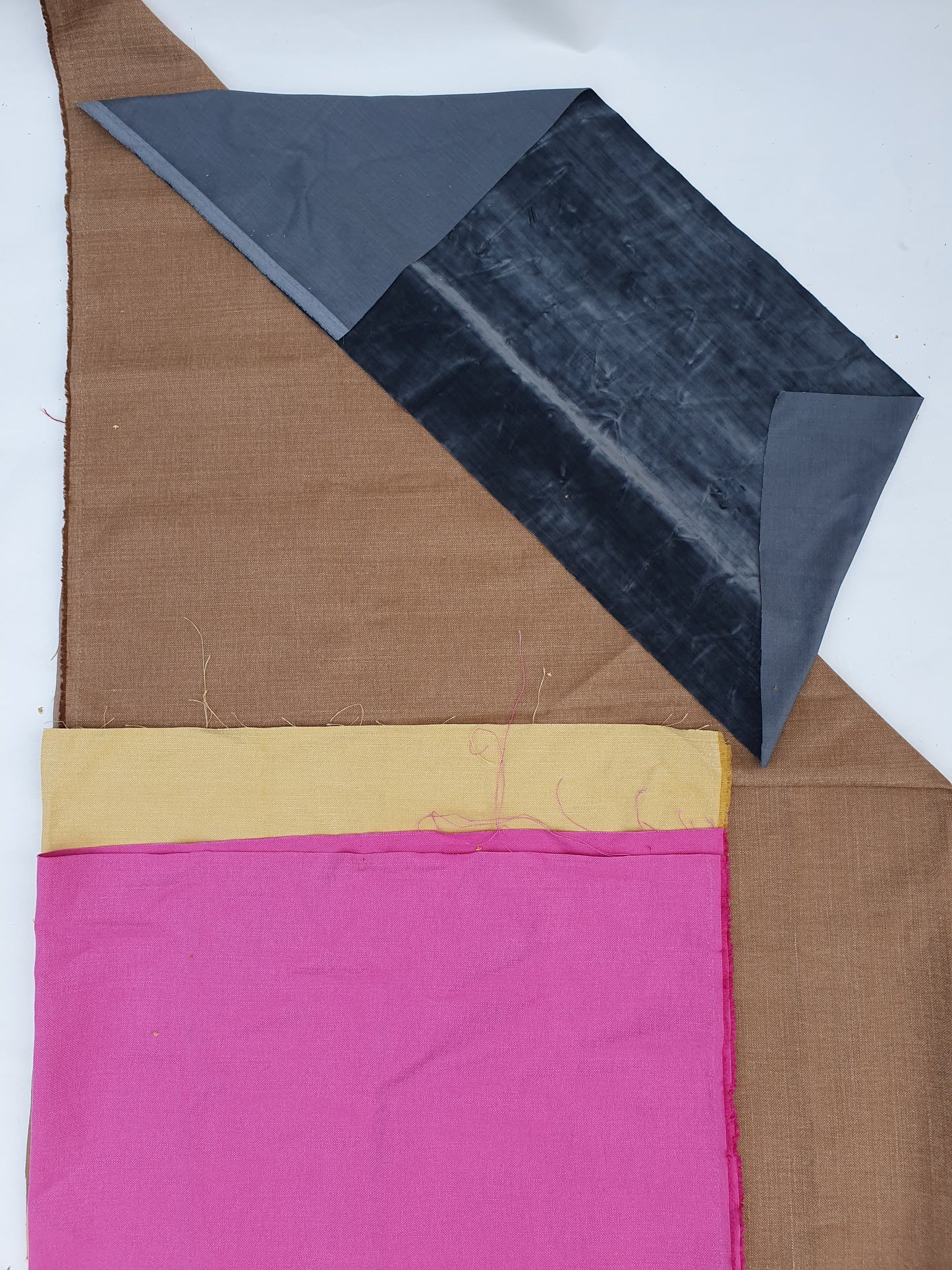 Various sizes, coloured fabrics , and textures can be seen 