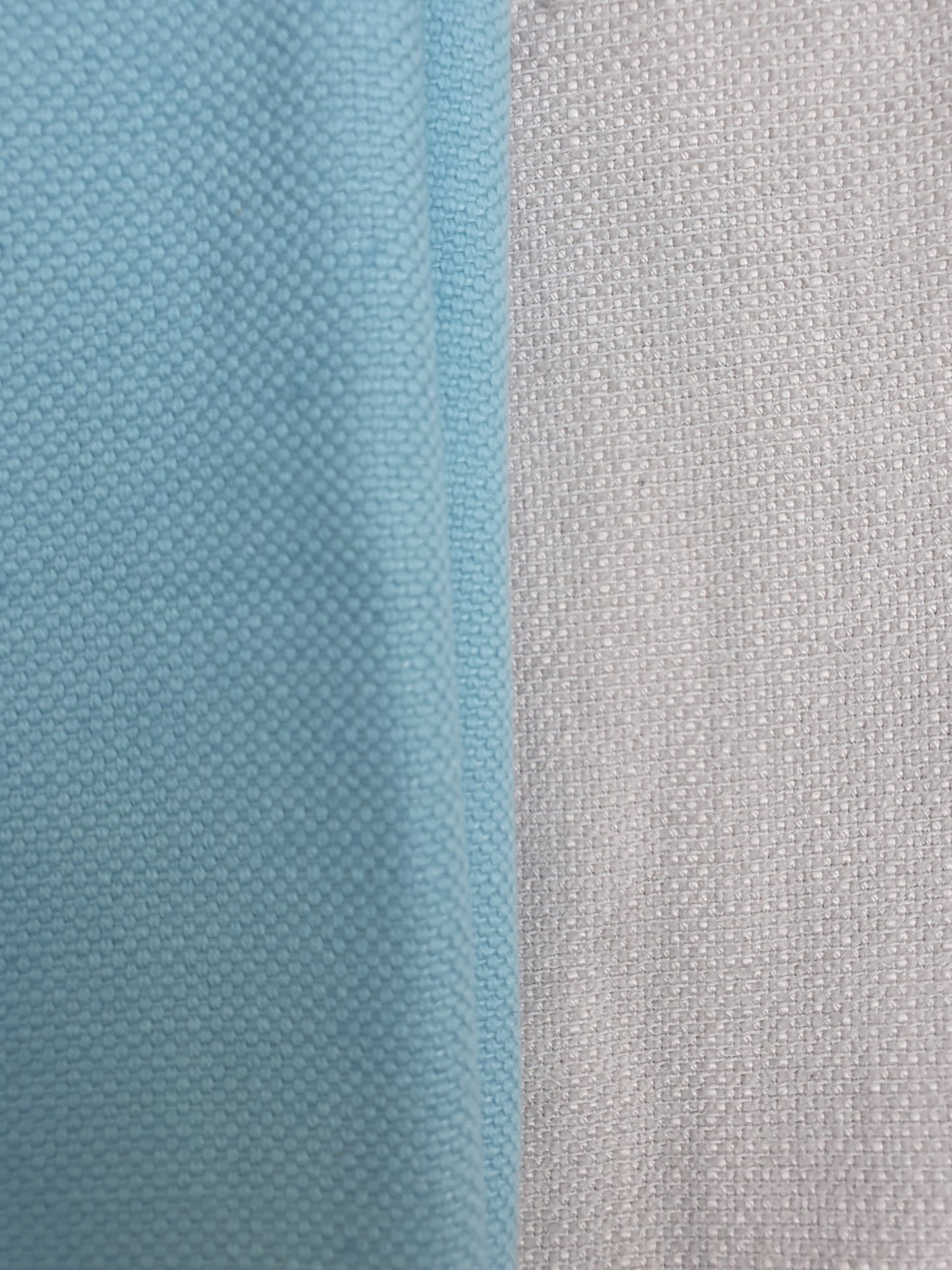 Close-up of light blue and white fabrics