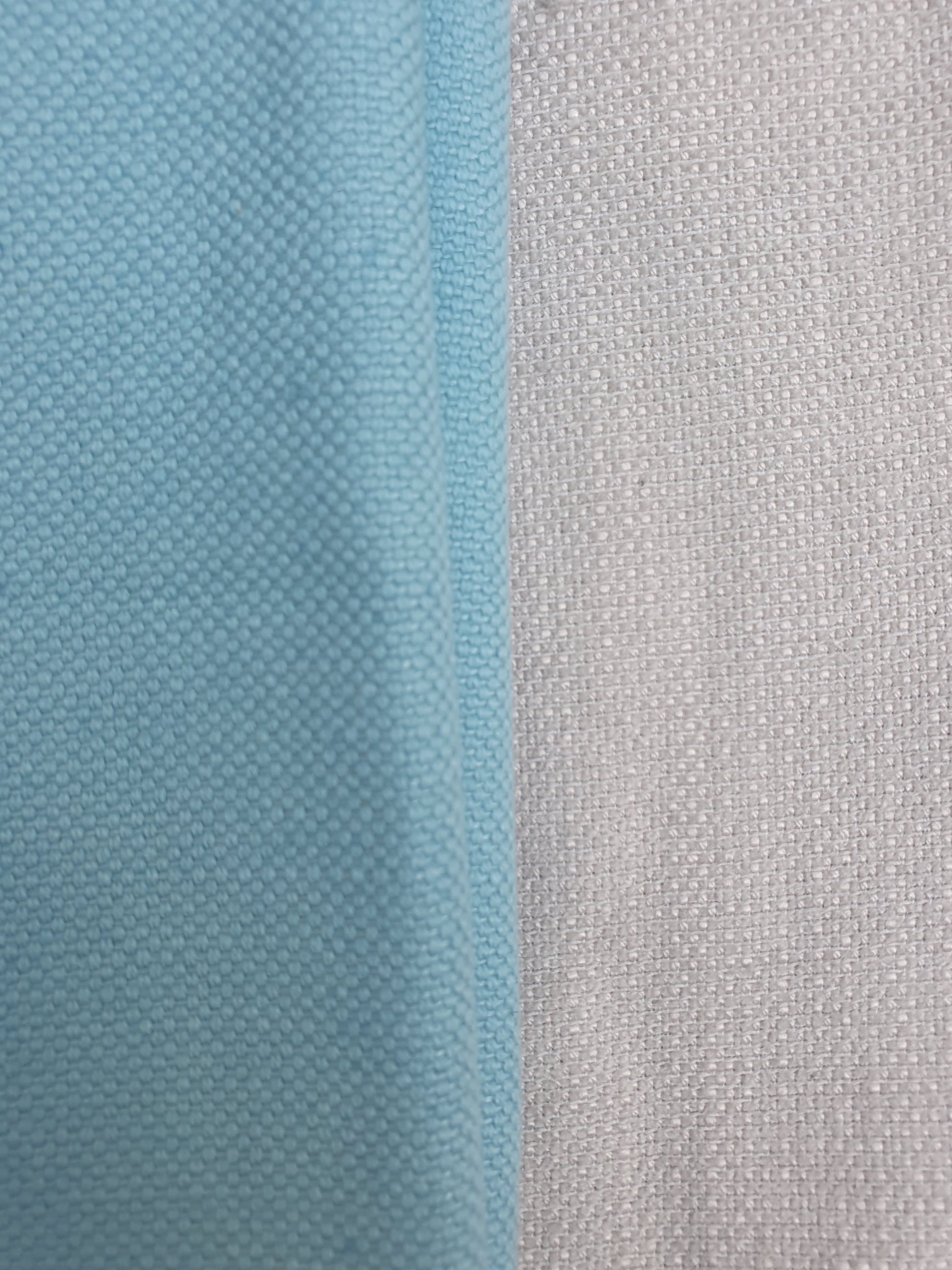 Close-up of light blue and white fabrics
