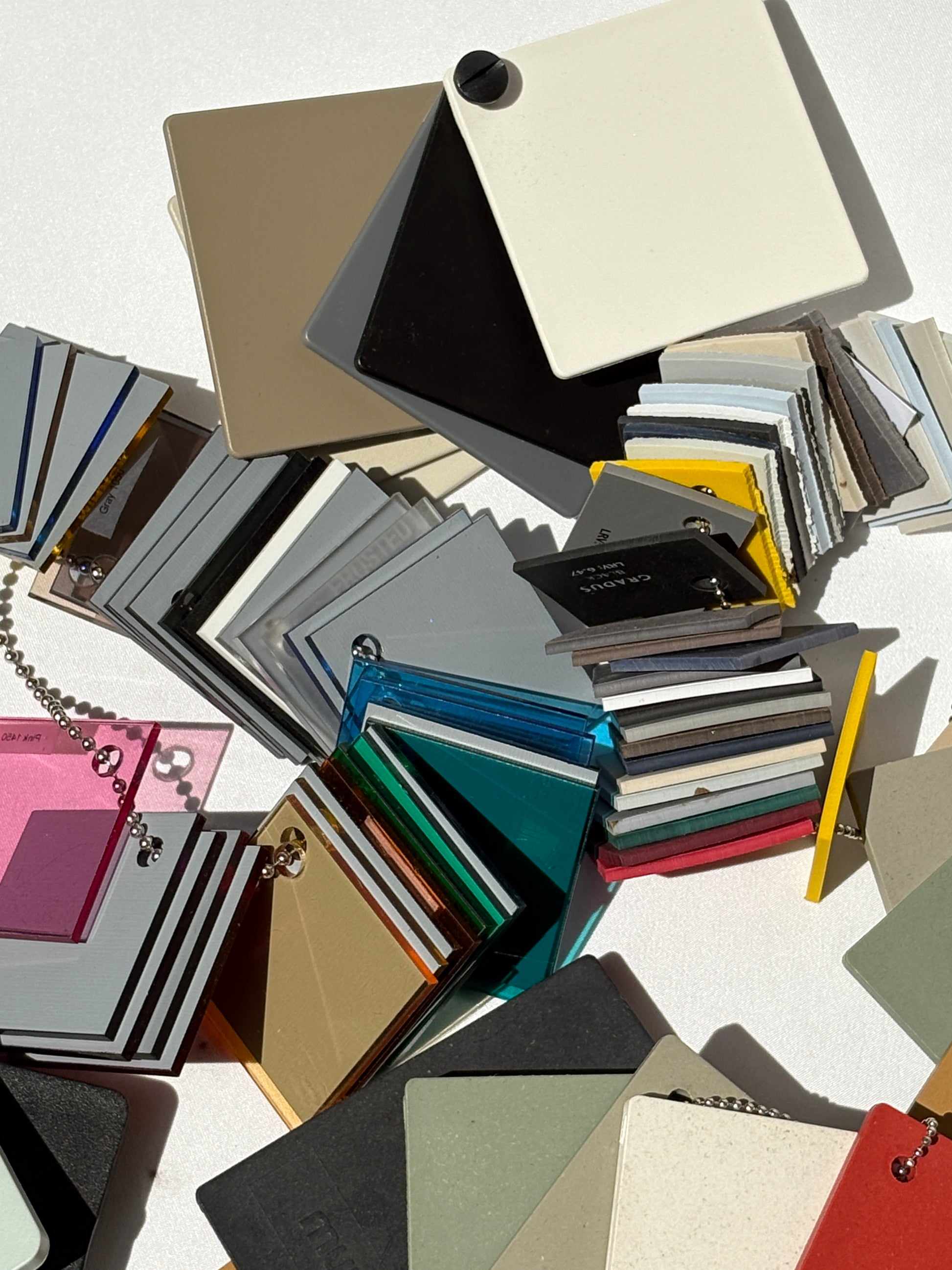 Collection of bundles of colour plastic architectural samples 