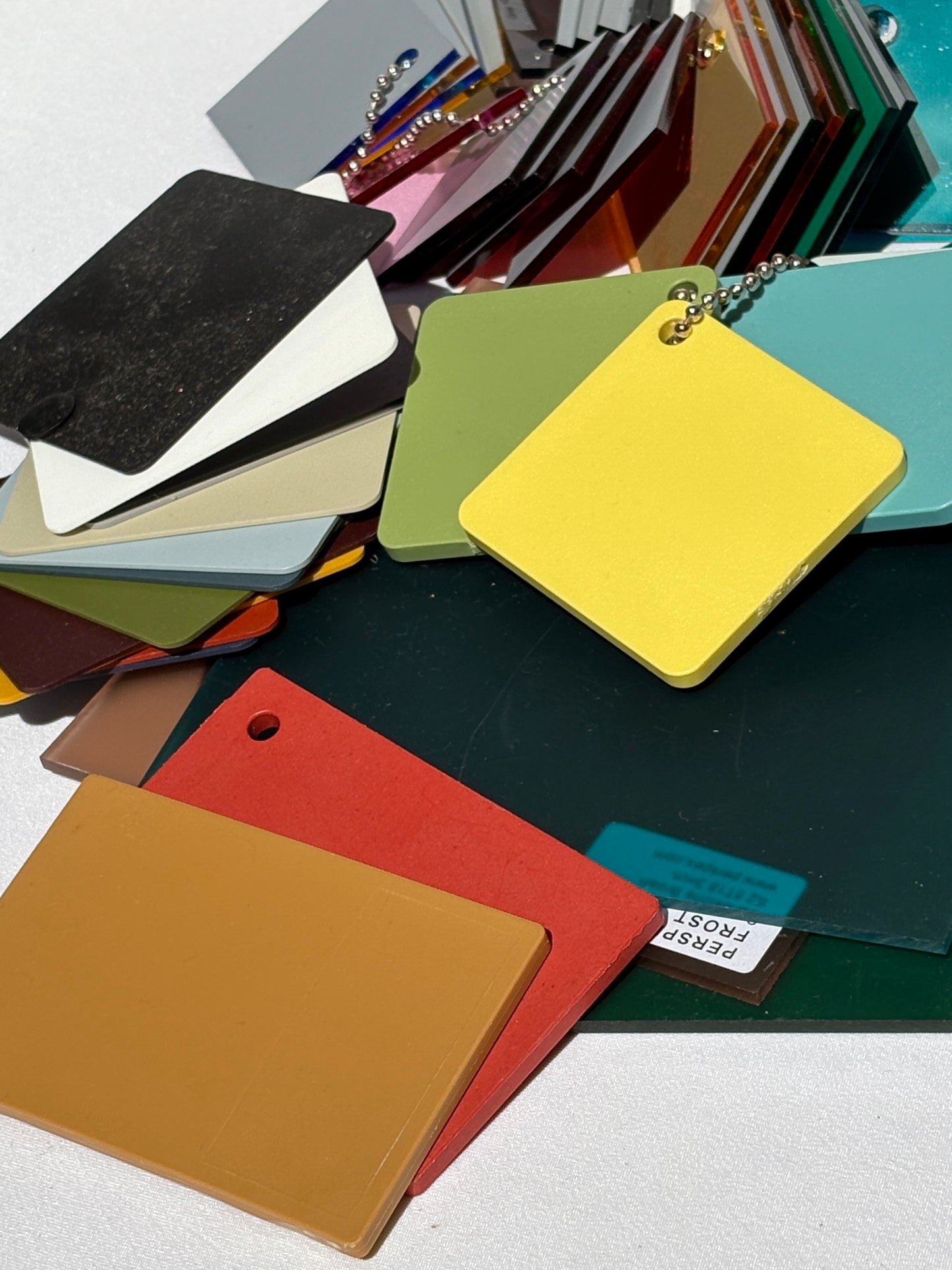 Close-up of a bundle of colour plastic architectural samples 