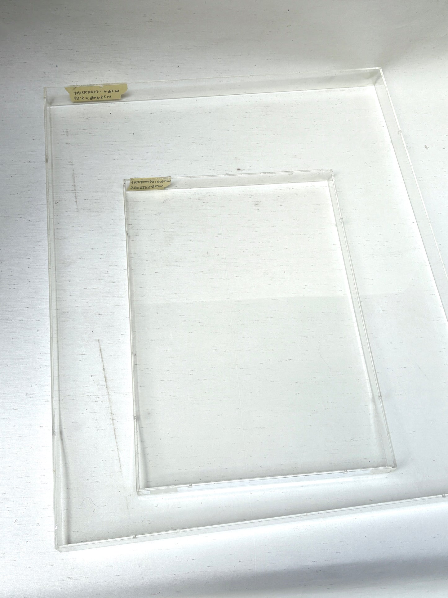2 different sizes of the clear rectangular perspex frames 