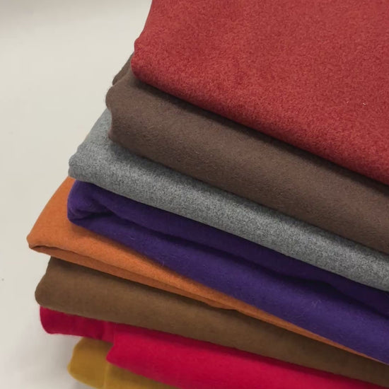 A video showing each folded felt fabric in various colours