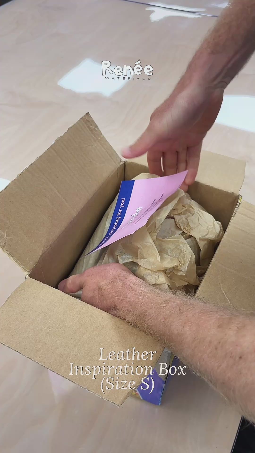 A video of unpacking a s size leather inspiration box, containing various colours, sizes 