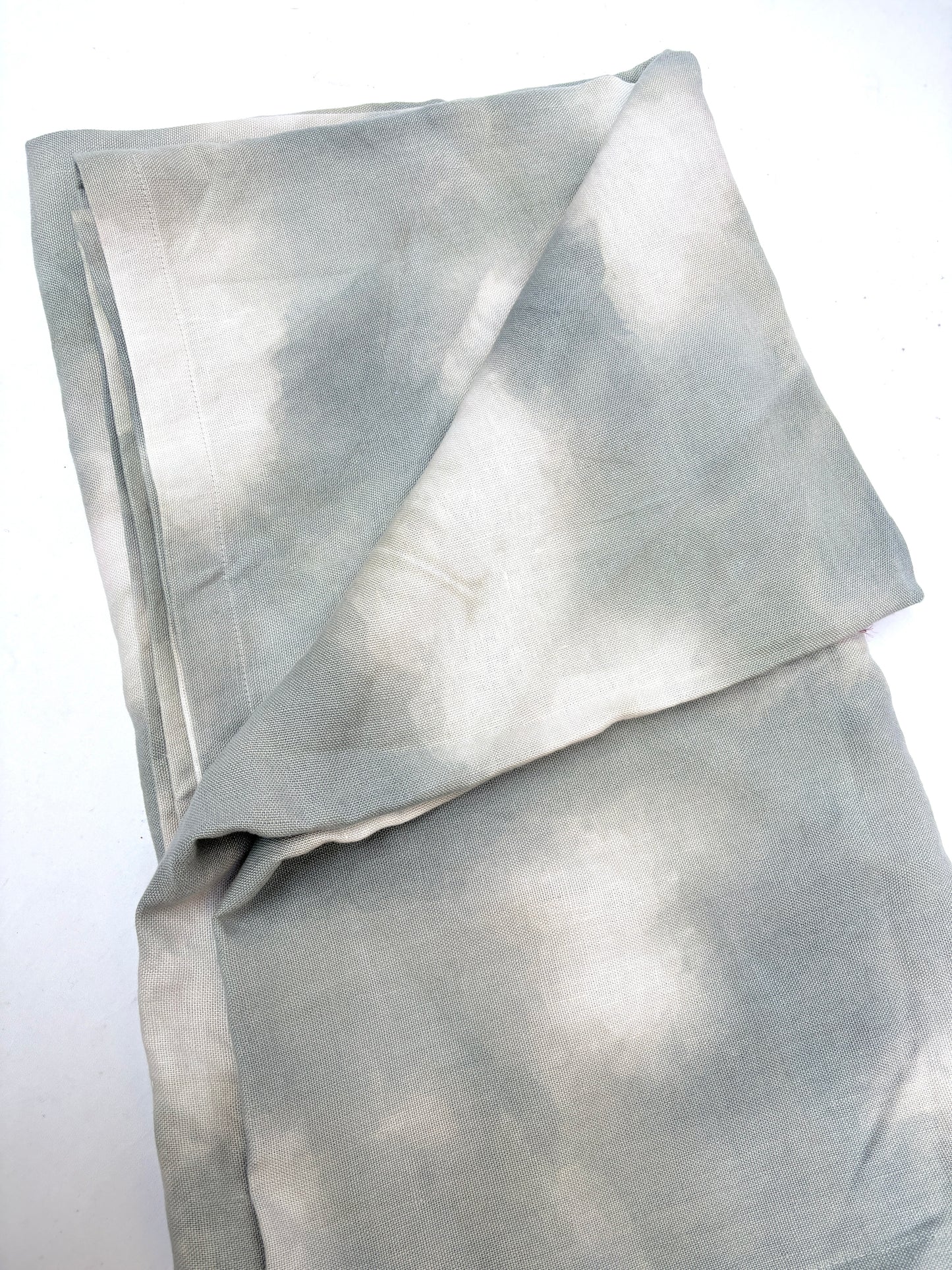 White and grey fluffy patterned textured fabric