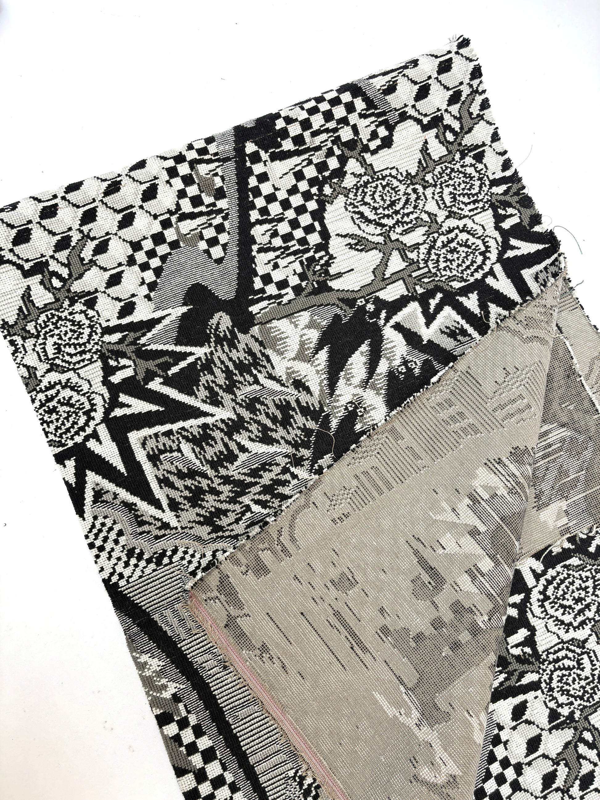 Black-and-white textured fabrics with rose patterns or comical designs