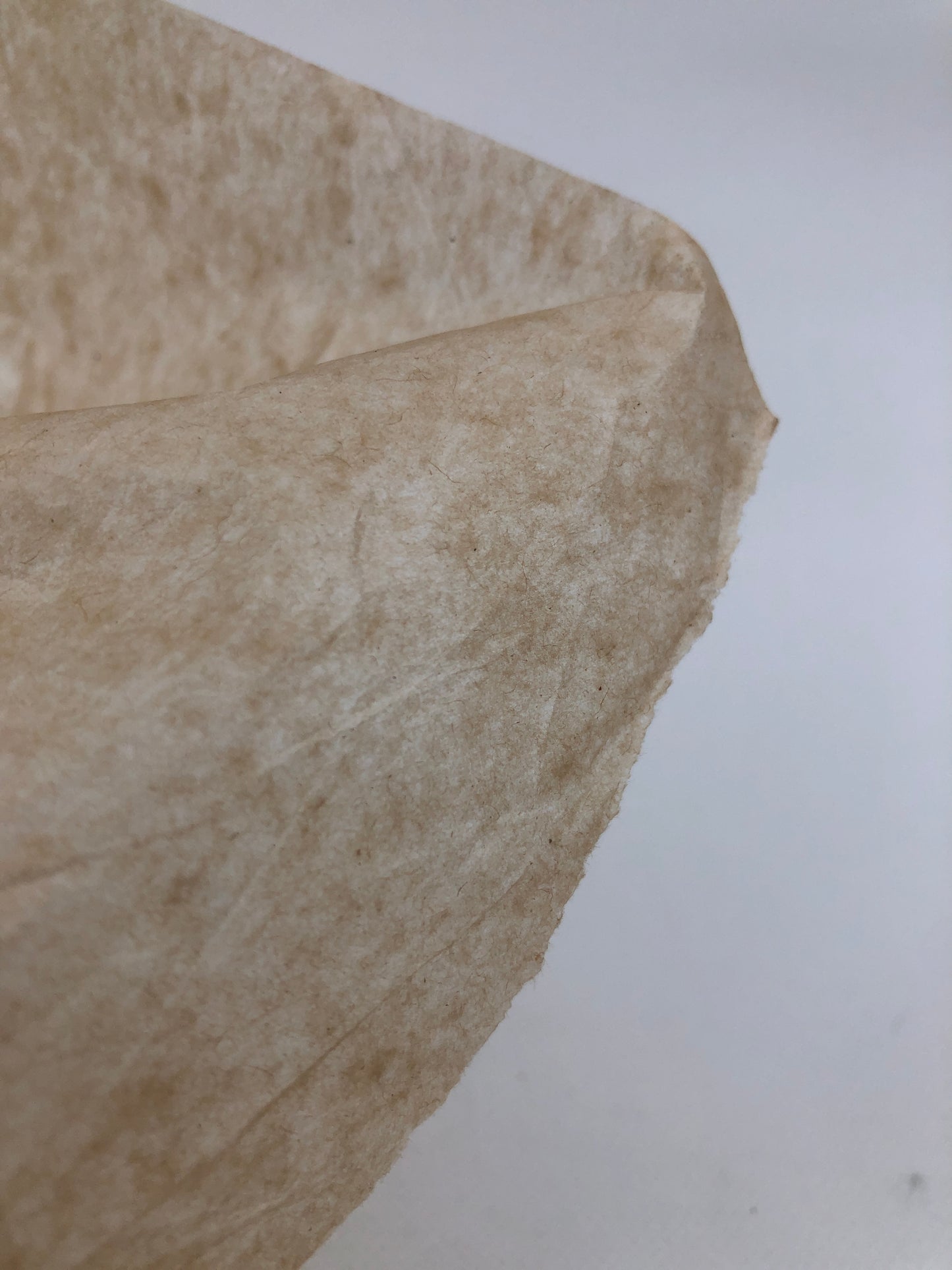Close-up of a brown tissue paper, thin texture