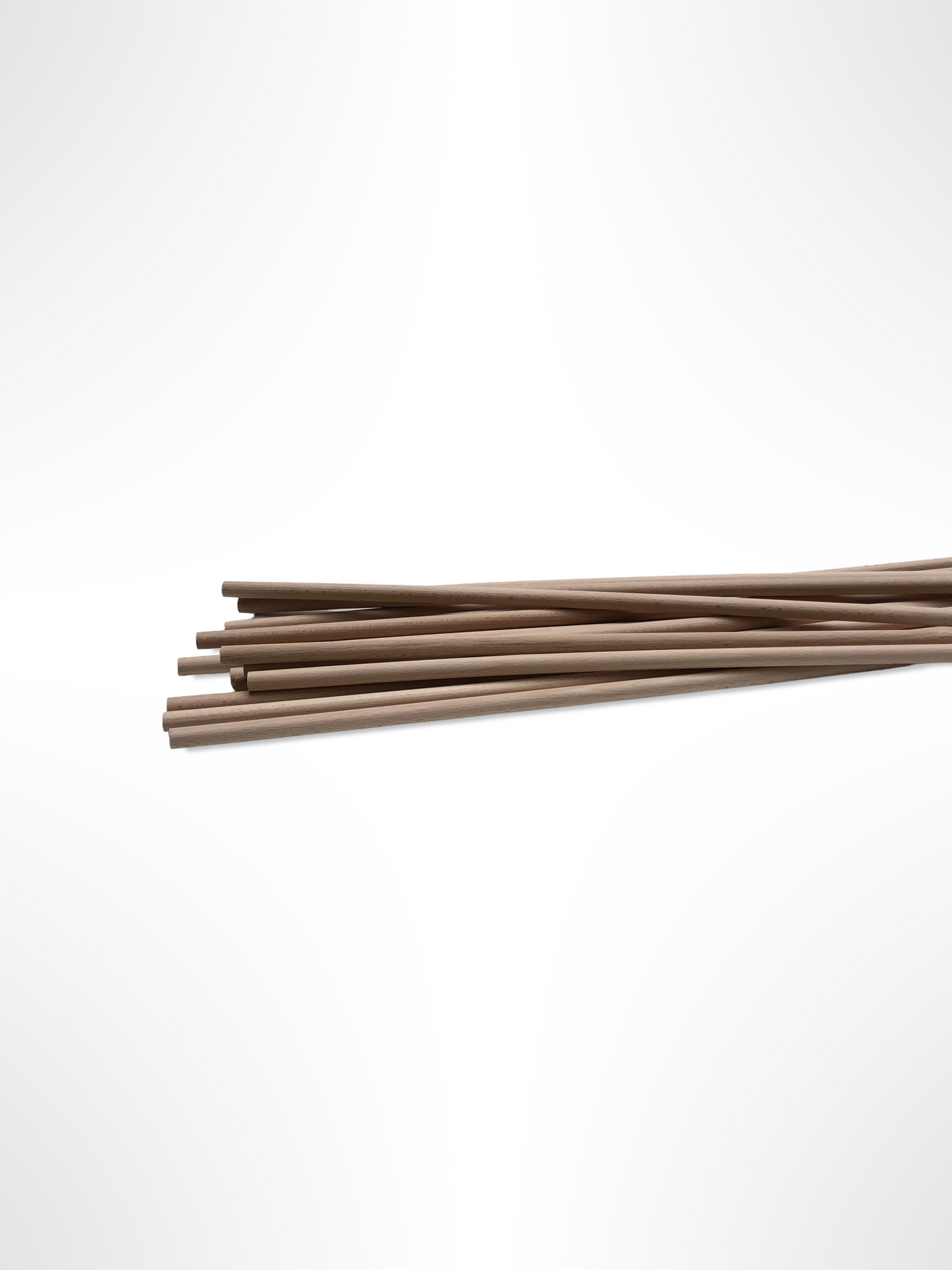 A pile of beechwood sticks with white background. 