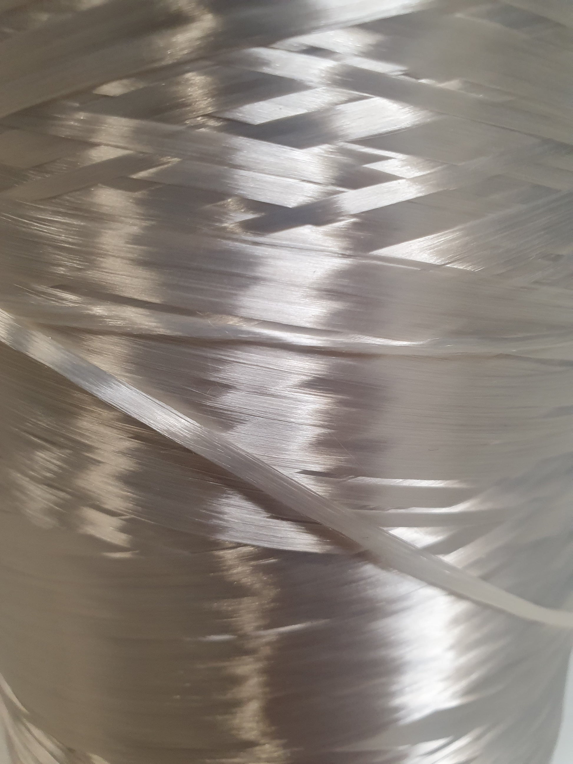 Close up of a cone of rayon multifilament yarn. 